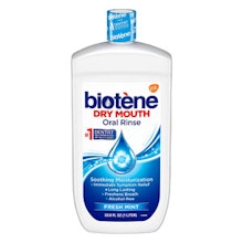 Biotene Dry Mouth Oral Rinse bottle displaying product packaging and label information.