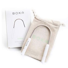 BOKA electric toothbrush with charger in cream linen pouch and white packaging box.