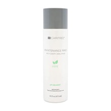 White skincare spray bottle with gray cap and green leaf detail on label.