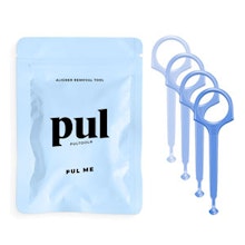 PUL brand dental product packaging with blue applicator tools on white background.
