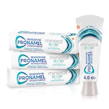 Pronamel toothpaste product lineup displaying three tubes and one bottle against white background.