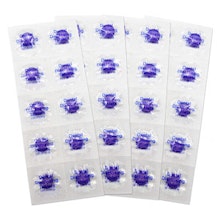Purple dental stickers or decals arranged in rows on white sheets, promotional dental practice merchandise.